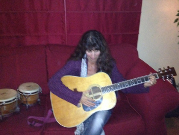 Karen learning guitar!