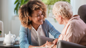 Caregiver and her senior patient at home