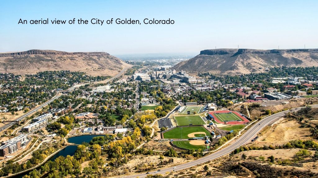 Aerial view of Golden, Colorado and the surrounding foothills with fall colors beginning to appear across the Front Range.