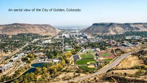 Aerial view of Golden, Colorado and the surrounding foothills with fall colors beginning to appear across the Front Range.